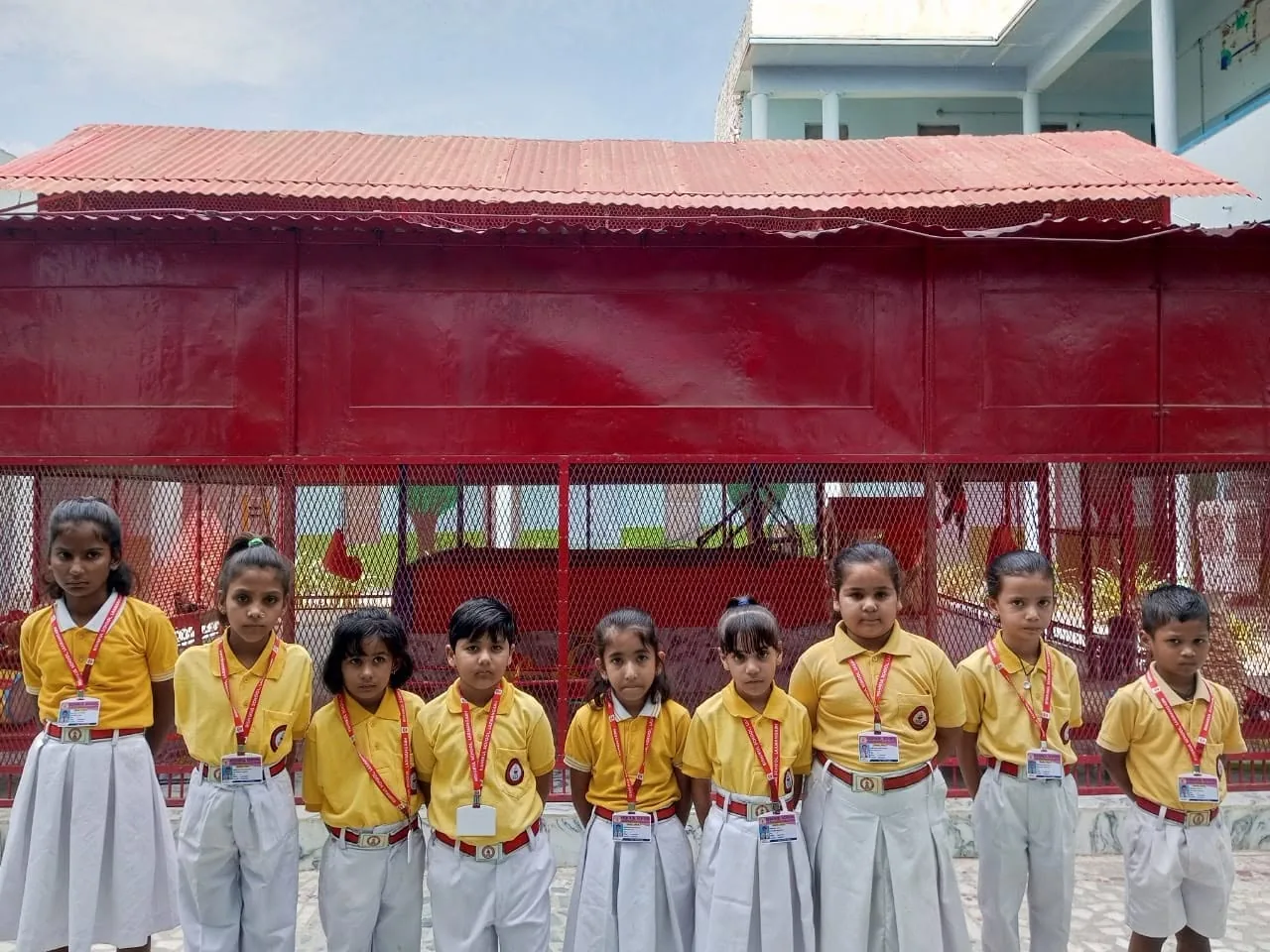 Montessori pupils lined up in the school courtyard at Laxmangarh